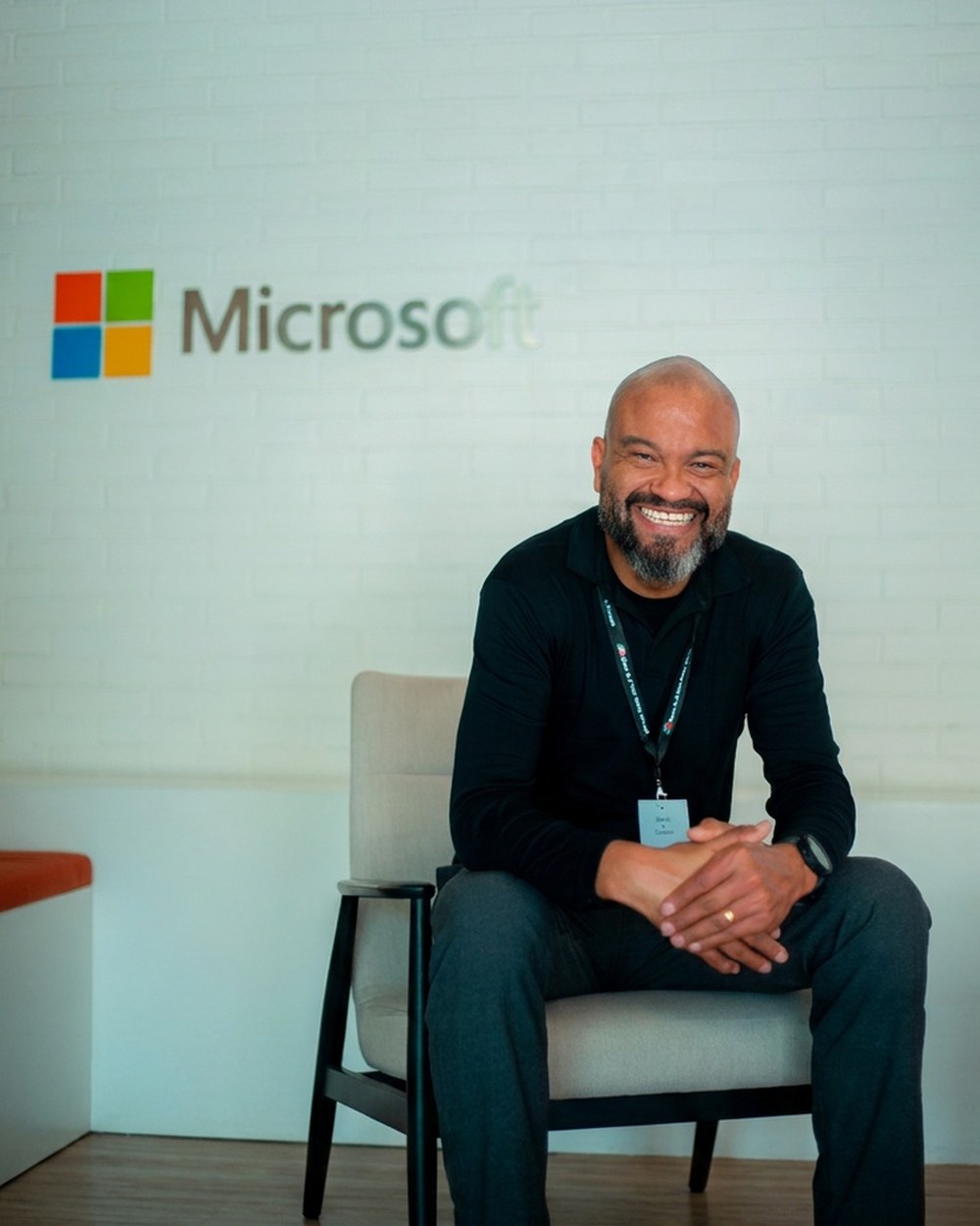 Gustavo Britto, Senior Azure Cloud Architect, seated in a Microsoft office